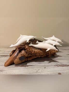 Vtg John Perry School of 6 Dolphins
Sculpture on Burl Wood Base | Pellucida Pod